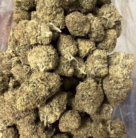 Close-up of Black Diamond cannabis buds, showcasing texture and density.