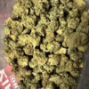 A close-up view of high-quality cannabis buds, showcasing the unique characteristics of Peach Ringz strain.
