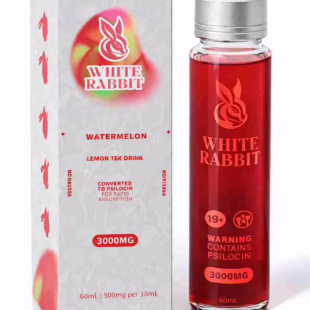 A bottle and box of White Rabbit Mushroom Drink - Watermelon 3000mg, a red liquid psilocybin supplement in professional packaging.