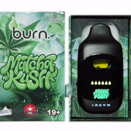 The Burn Disposable Pen 3g - Matcha Kush vape device shown next to its green packaging featuring cannabis leaf and ice graphics.