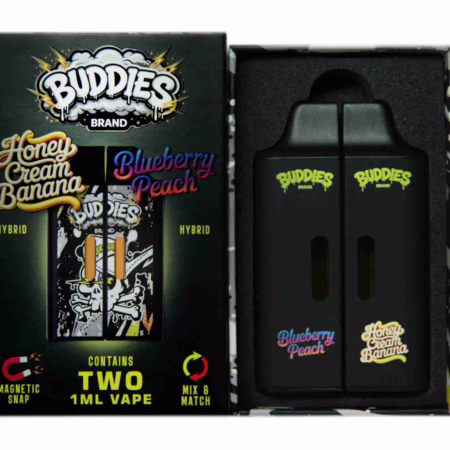 Two Buddies Brand disposable vape pens in Honey Cream Banana and Blueberry Peach flavors inside a black magnetic snap storage box for AUTO-DRAFT.